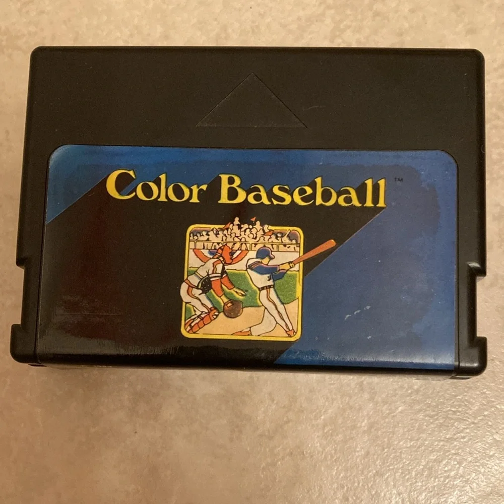 Radio Shack TRS-80 joysticks, game cable, game cartridge and Color Basic manual